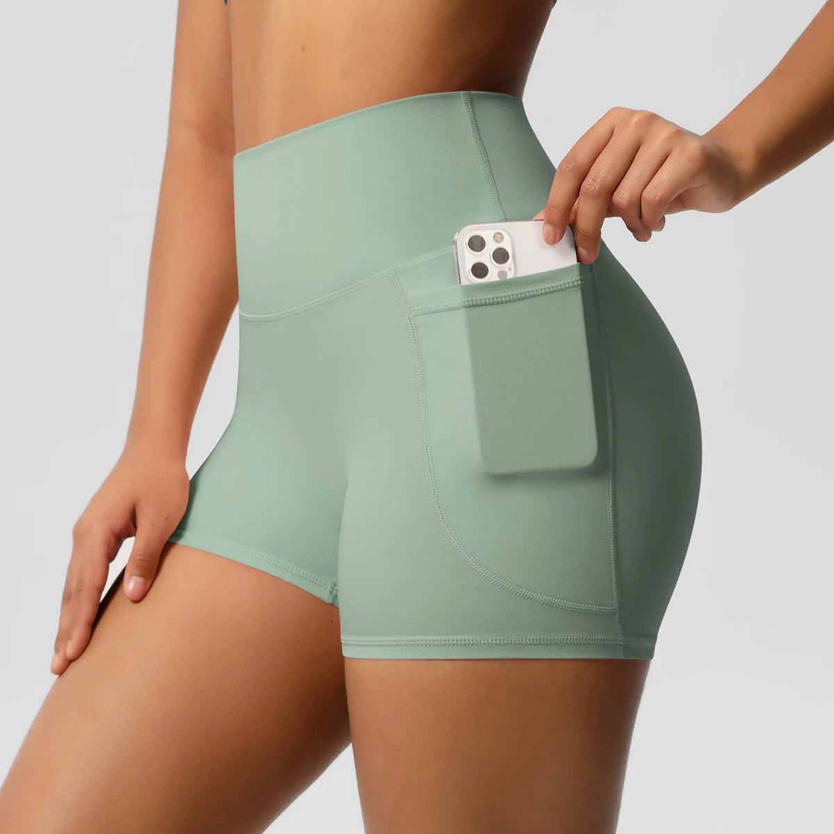 Women's Solid Color Nylon Yoga Tightening Tummy Lifting Shorts Outdoor Cycling Running With Pockets Sports Shorts Gym Pilates