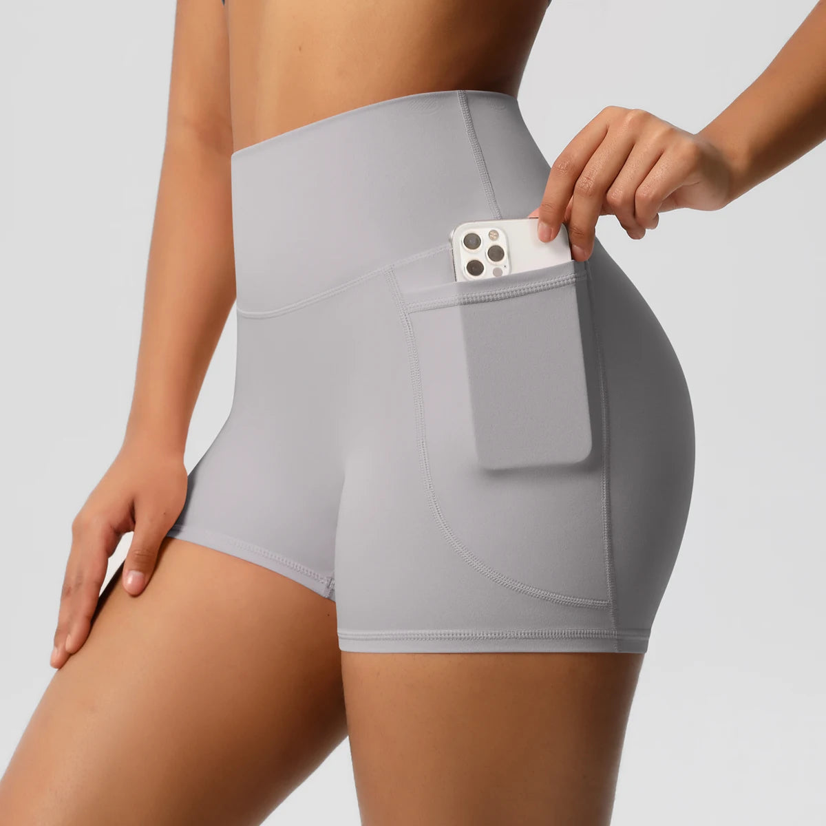 Women's Solid Color Nylon Yoga Tightening Tummy Lifting Shorts Outdoor Cycling Running With Pockets Sports Shorts Gym Pilates