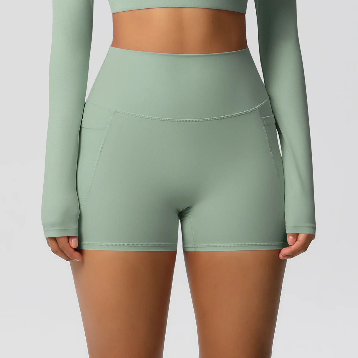 Women's Solid Color Nylon Yoga Tightening Tummy Lifting Shorts Outdoor Cycling Running With Pockets Sports Shorts Gym Pilates