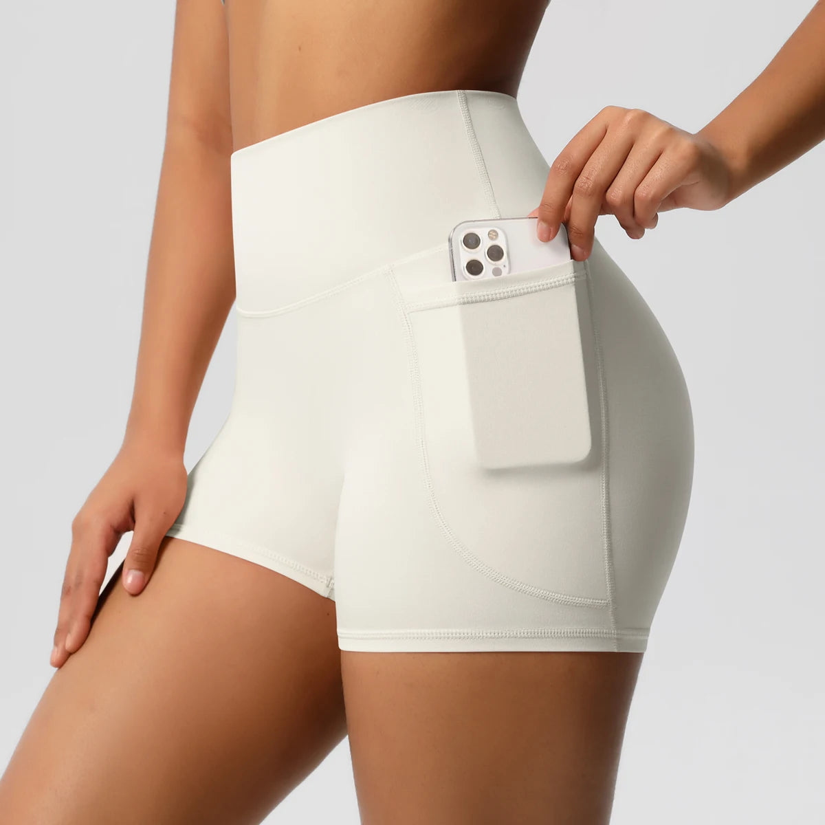 Women's Solid Color Nylon Yoga Tightening Tummy Lifting Shorts Outdoor Cycling Running With Pockets Sports Shorts Gym Pilates