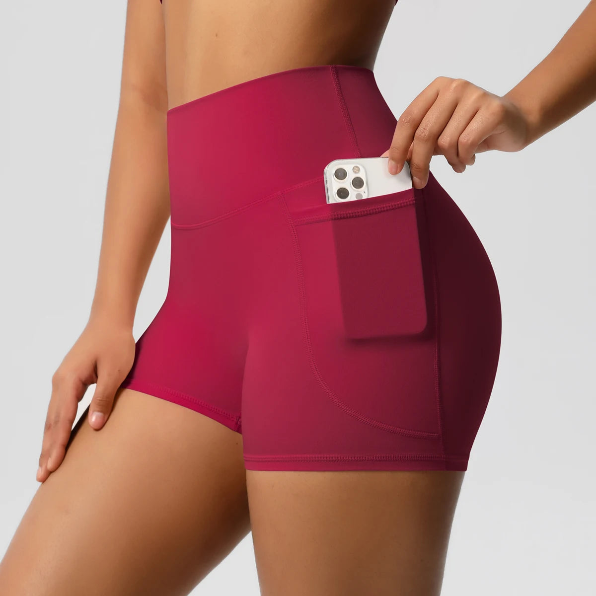 Women's Solid Color Nylon Yoga Tightening Tummy Lifting Shorts Outdoor Cycling Running With Pockets Sports Shorts Gym Pilates